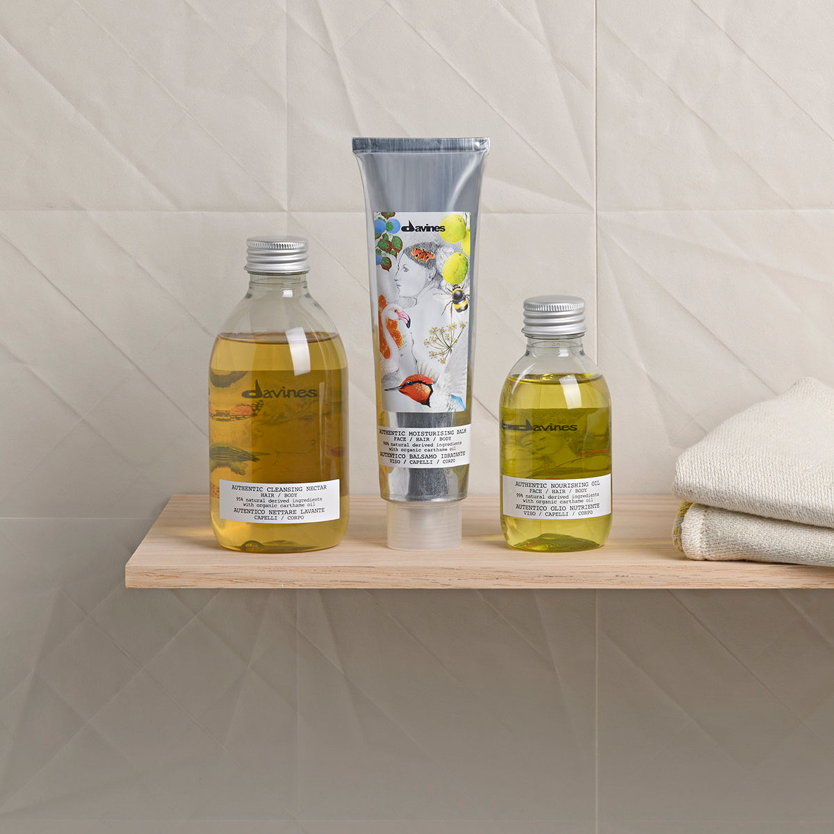 Davines Authentic range lifestyle shot, cleansing nectar, moisturising balm and nourishing oil