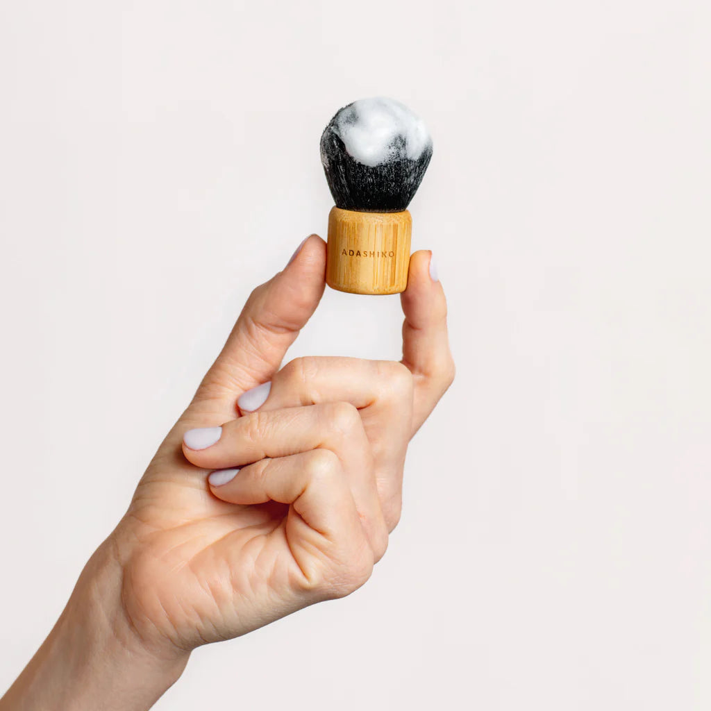 kabuki cleansing brush in use