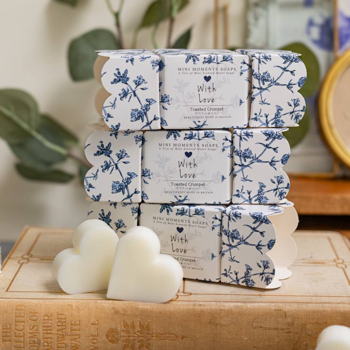 Toasted Crumpet Chateau blue toile cracker gift boxes stacked with heart shaped mini soaps
