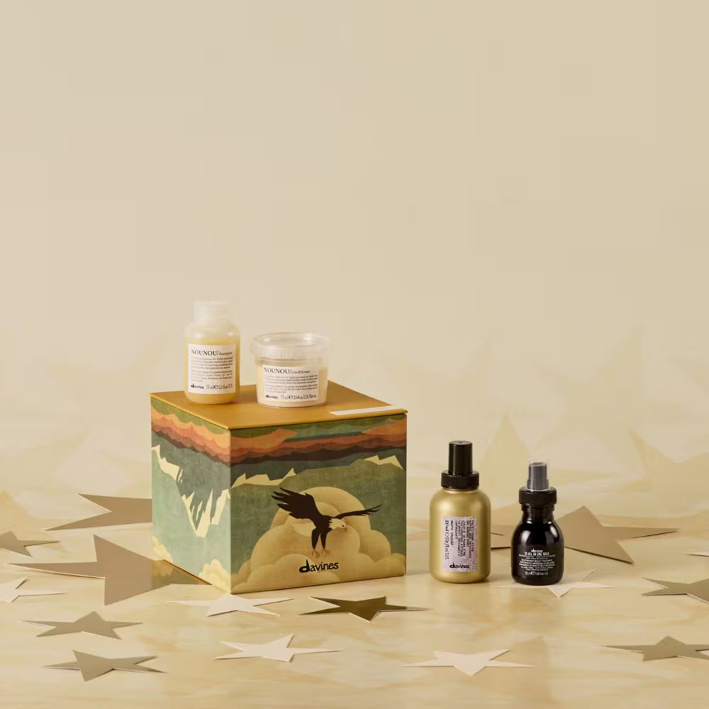Skincare products with a decorative box on a beige background