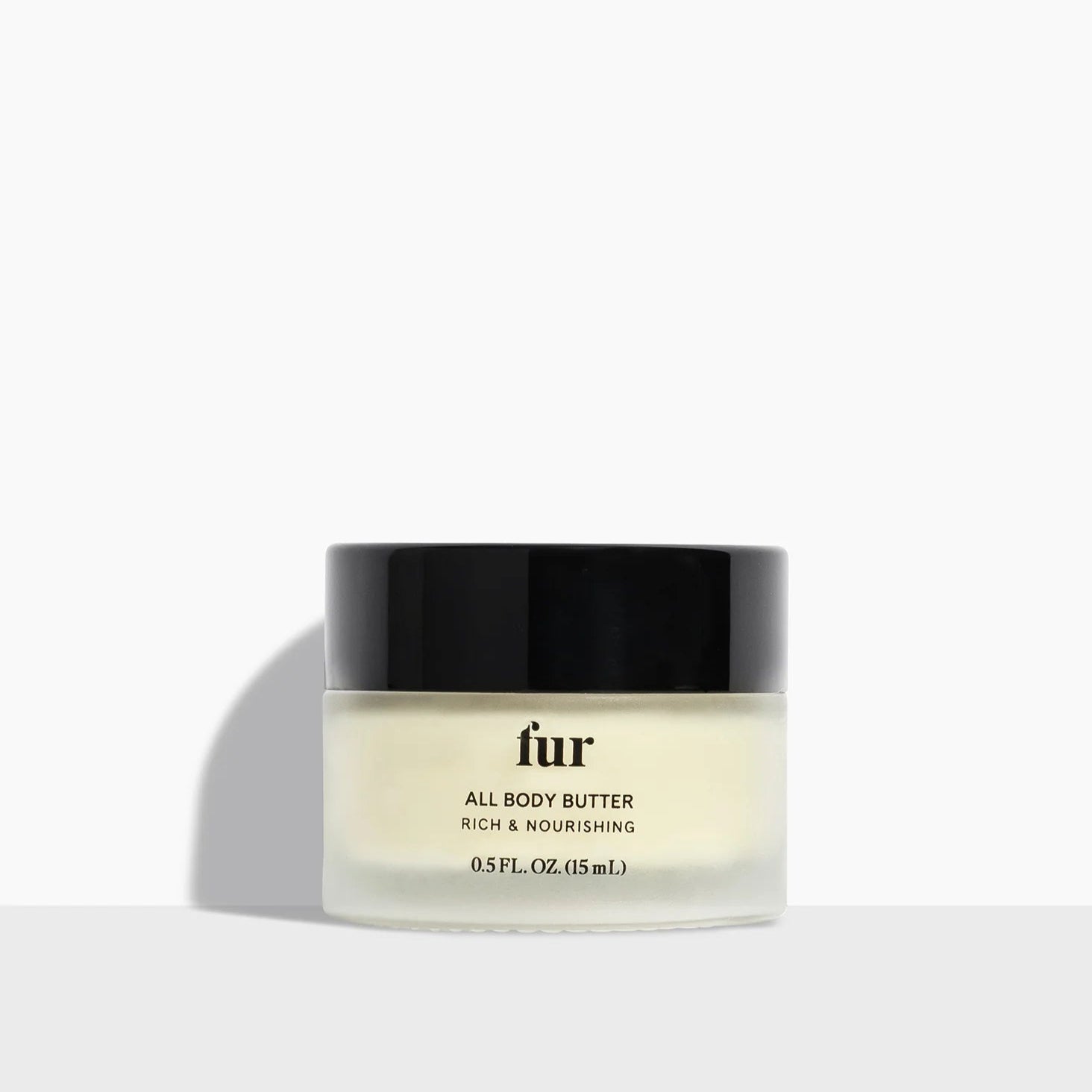 Jar of fur all body butter on a white background