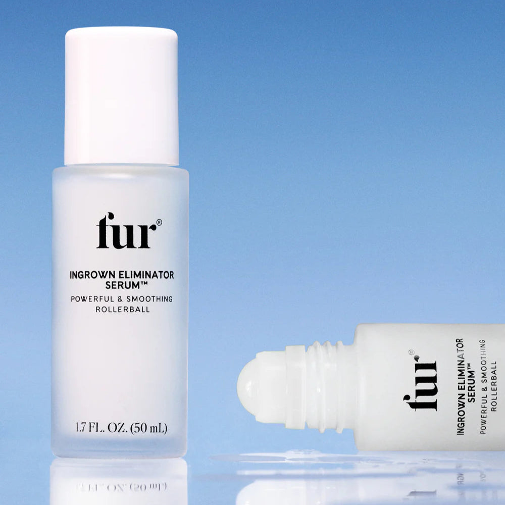 Fur Ingrown Eliminator Serum bottle and rollerball on a blue background