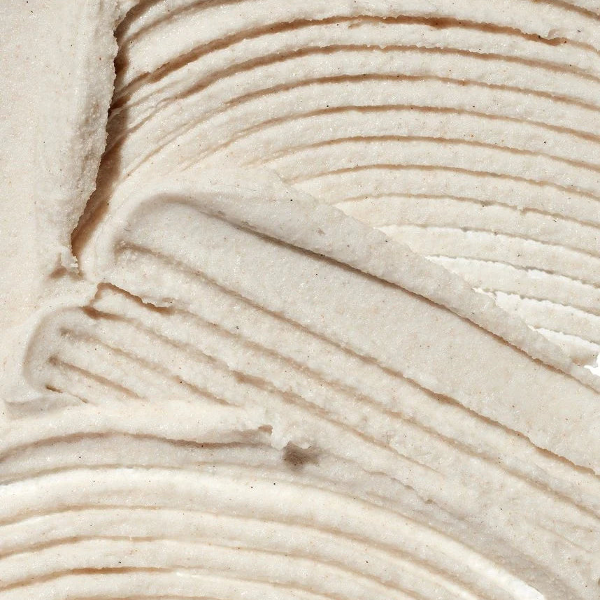Close-up of textured beige scrub with wavy pattern