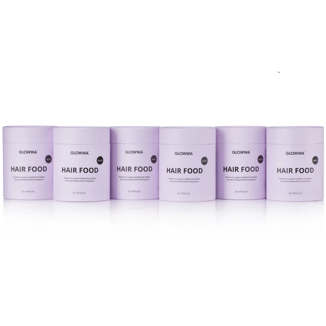 Row of purple 'GLOWW' hair product containers on a white background