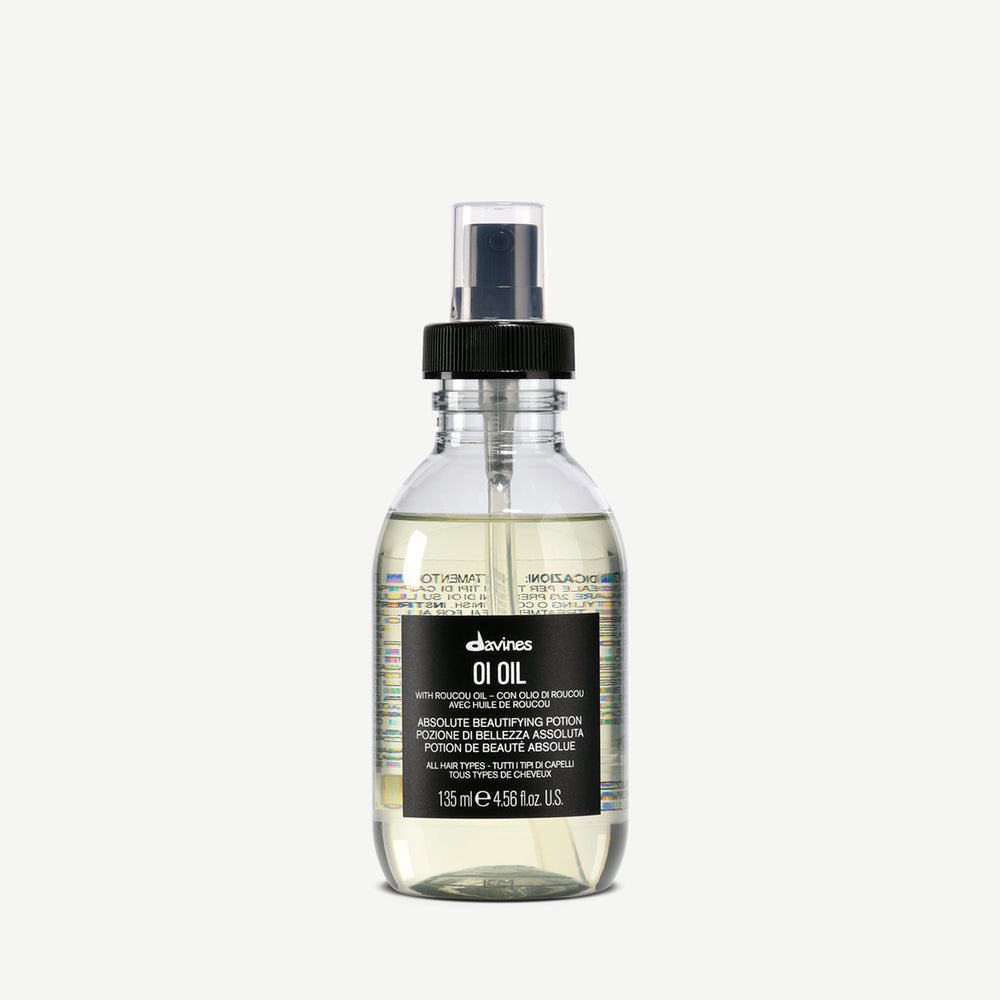 Davines Oi Oil white background bottle multifunction beautifying hair oil for frizz control and shine — Sable Boutique NZ