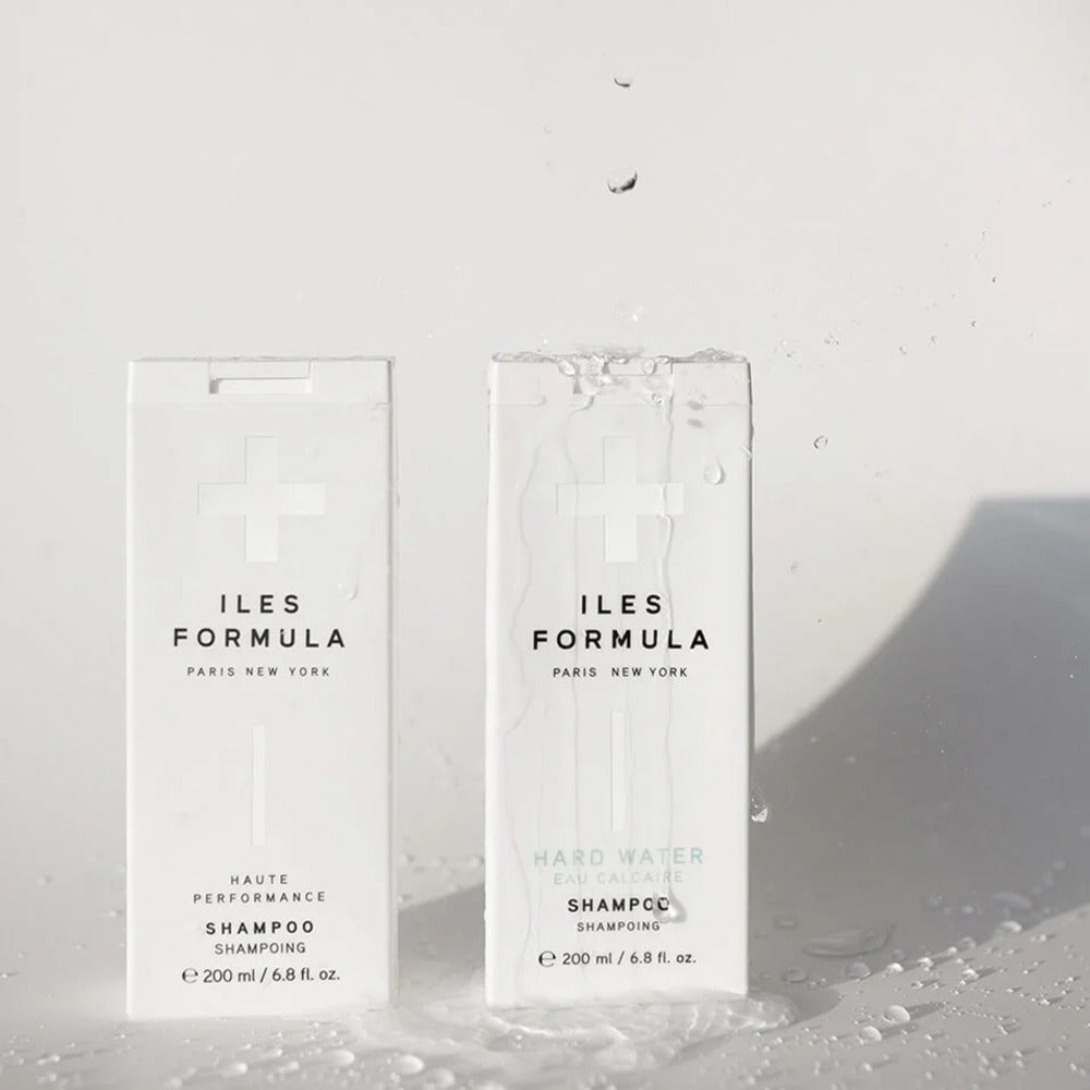Iles Formula Hard Water Shampoo lifestyle shot with rich lather on wet hair