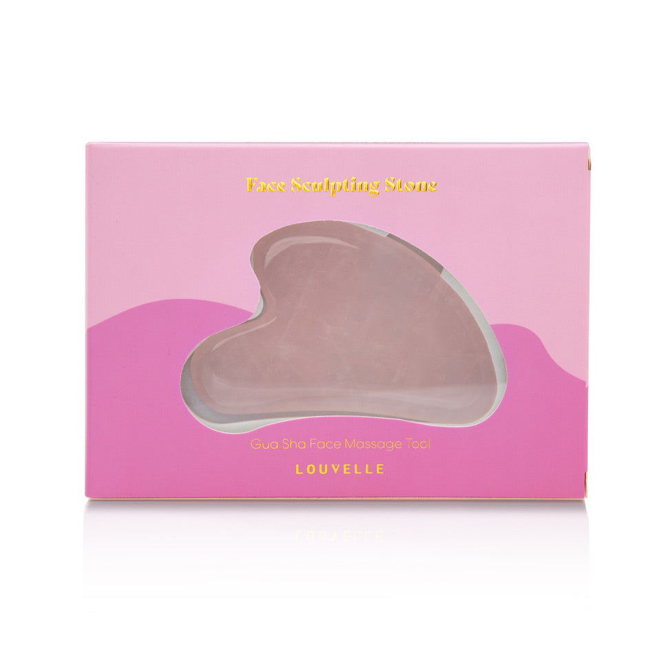 Louvelle rose quartz gua sha facial sculpting tool on white background