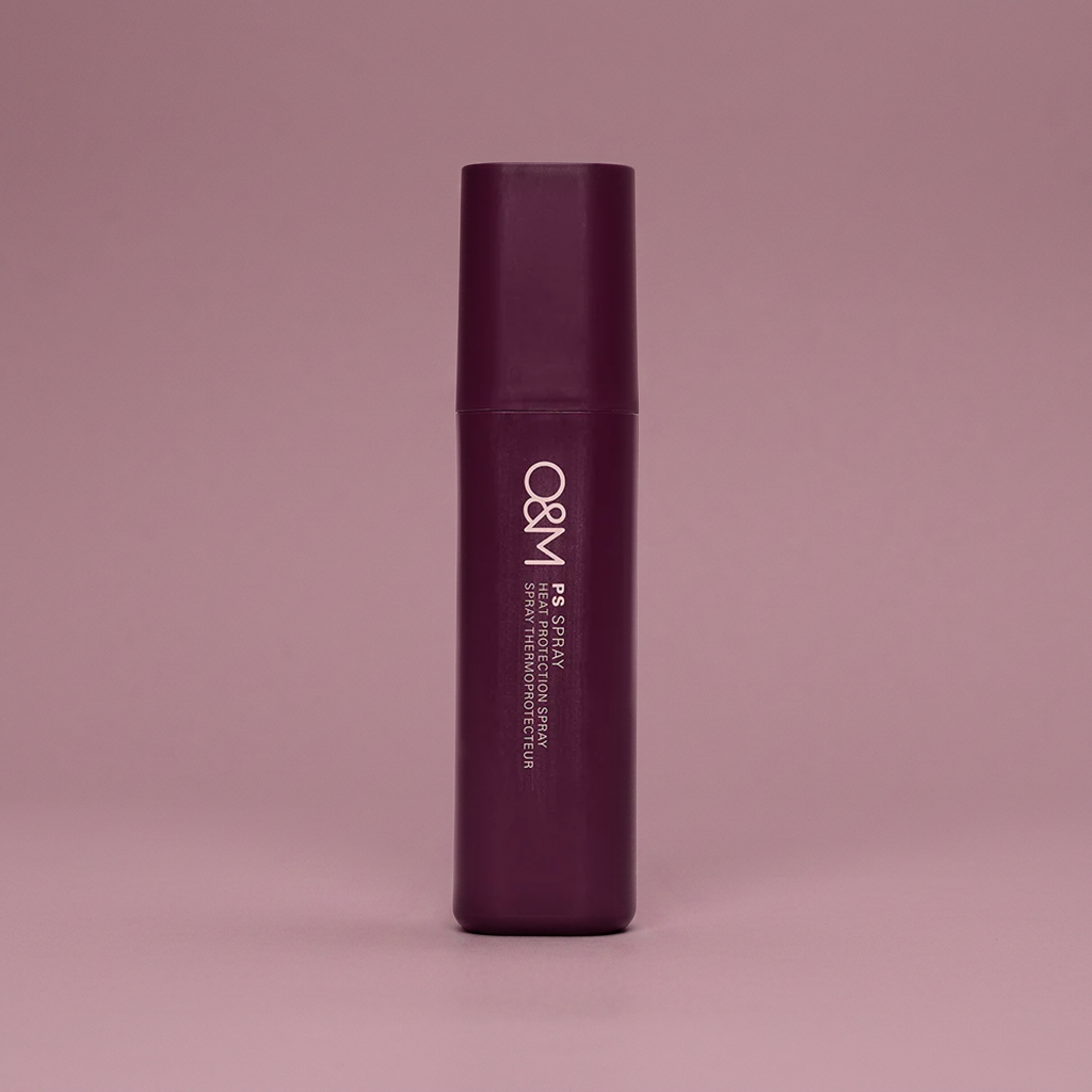 Original Mineral PS Spray purple spray bottle on a matching pink background