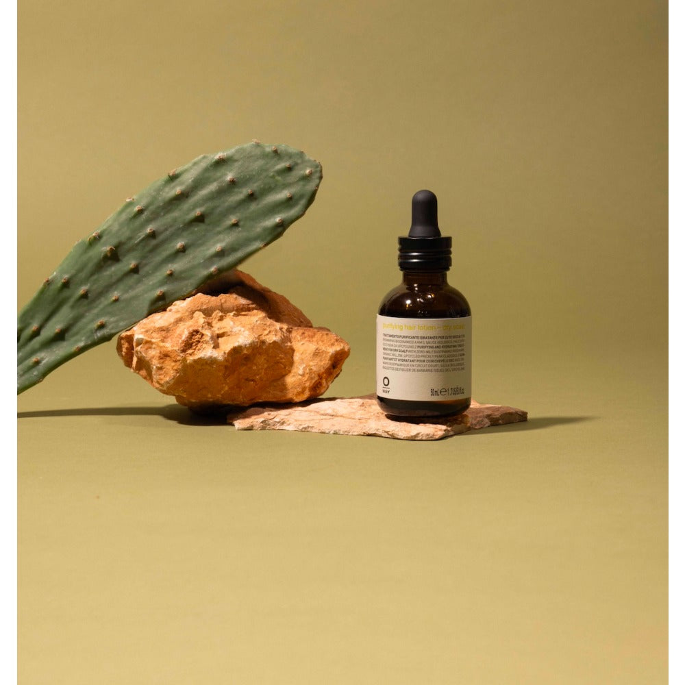 Oway purifying scalp care range with Dandruff Remedy bottle