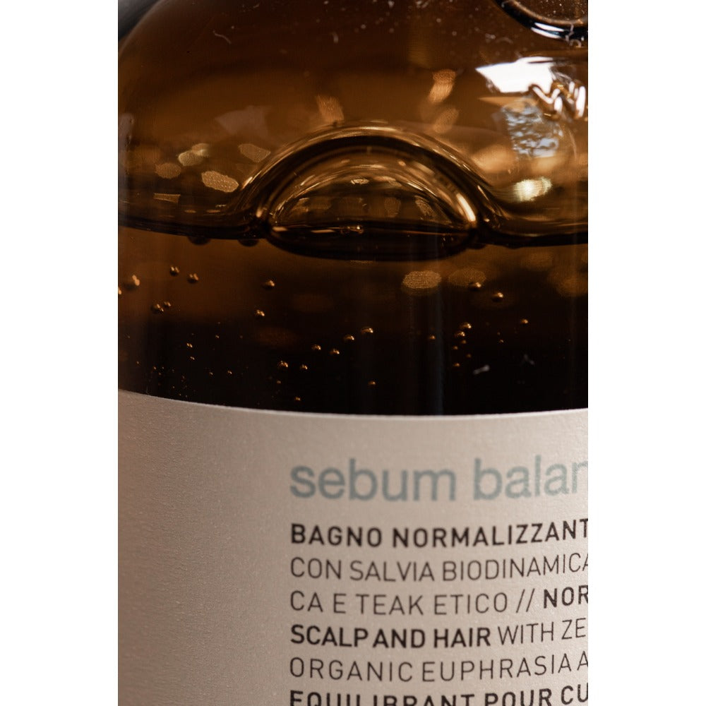 Oway Sebum Balance Hair Bath bottle close-up with water droplets