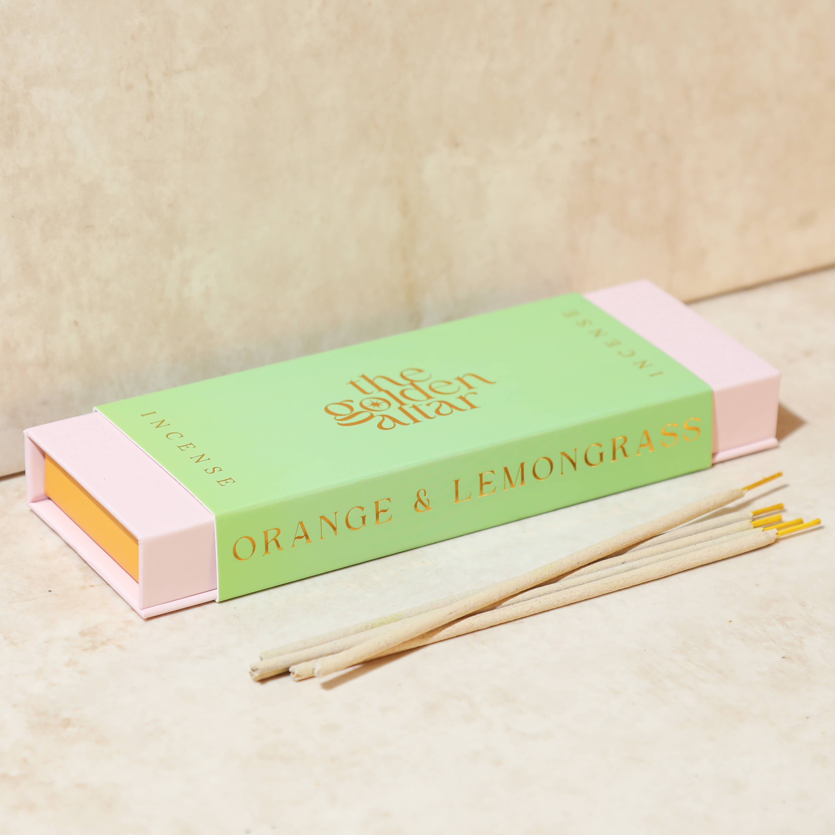 The Golden Altar Incense packaging with 'Orange & Lemongrass' text on a beige background