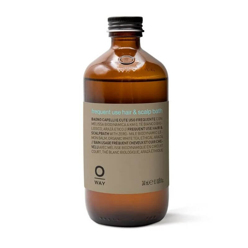 Oway Frequent Use Hair & Scalp Bath
bottle with a label displaying information about the product, which is a hair and scalp bath. The brand name 'Oway' is visible.