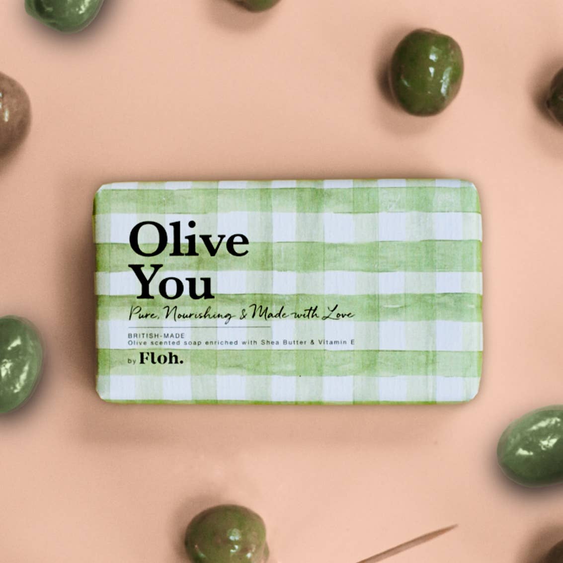 Toasted Crumpet Olive You 190g soap bar in green gingham wrap surrounded by olives