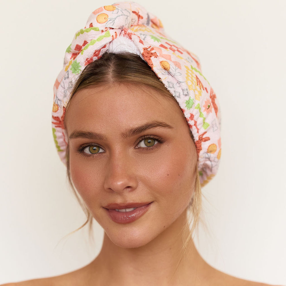 Louvelle Riva microfibre hair towel wrap in Santorini Sun print for fast, gentle drying