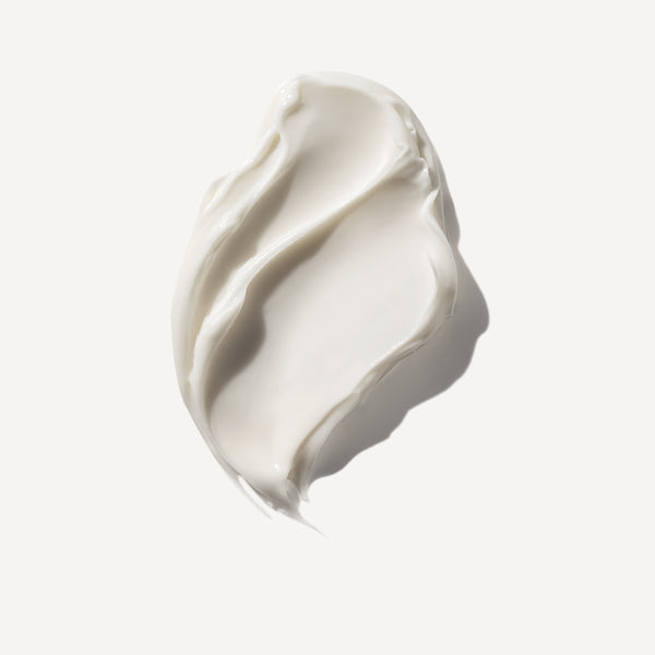 White cream swatch on a light gray background