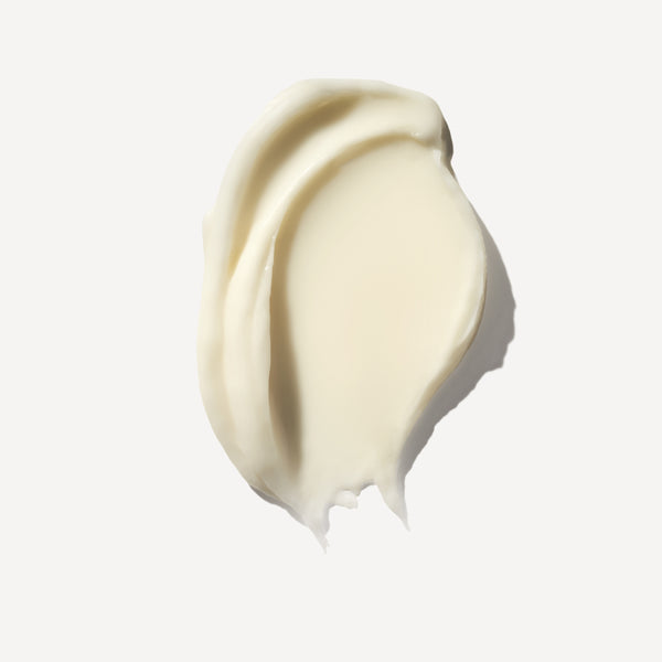Olaplex Swirl of light beige cream on a white background