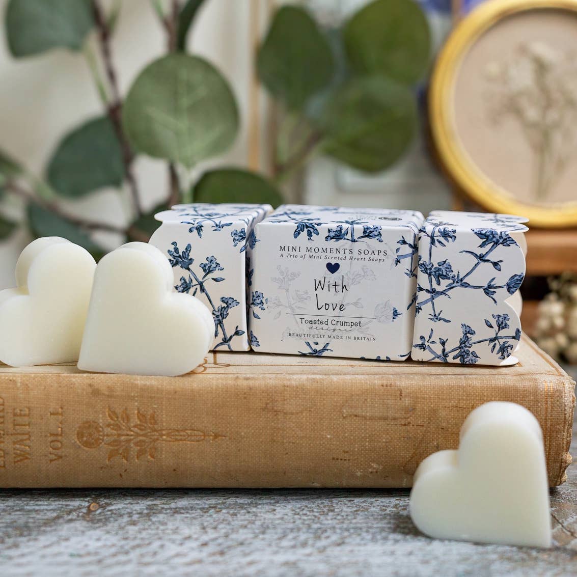 Toasted Crumpet Chateau boxed mini soap in a blue toile cracker shaped gift box with heart shaped soaps