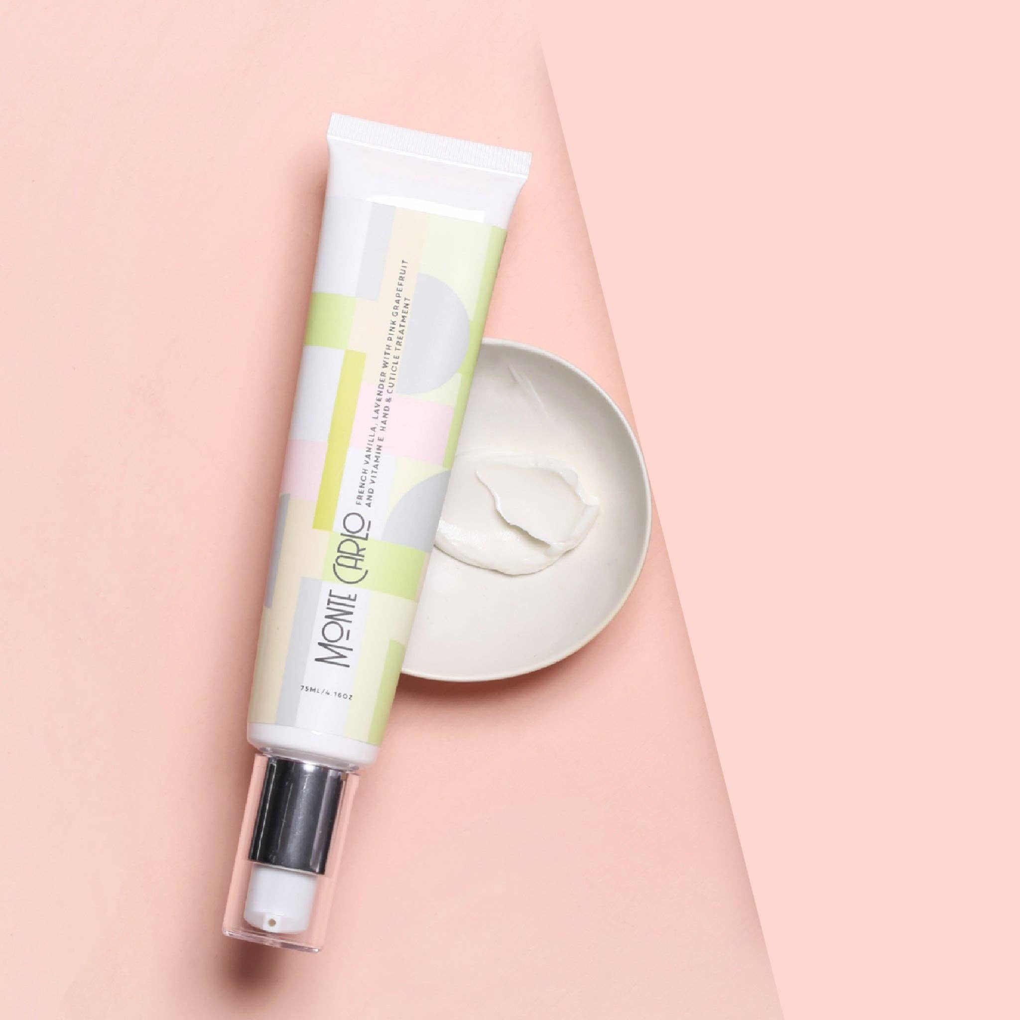 Dan300 Hand & Nail Treatment tube with a small amount of cream swatch on a pink background