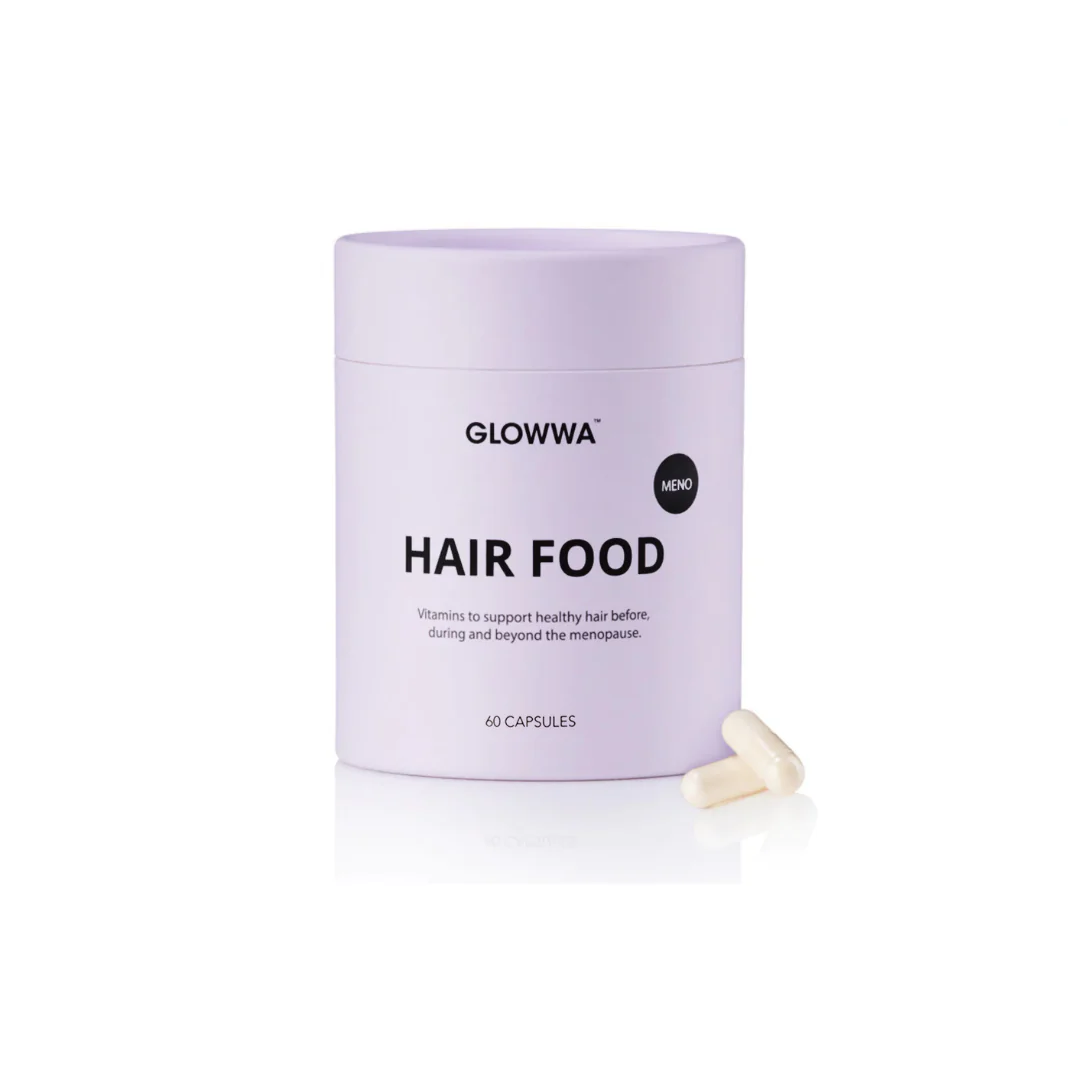 Purple container of GLOWWA Hair Food vitamins on a white background