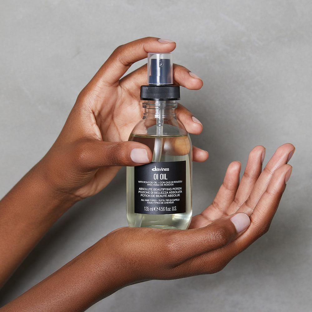Davines Oi Oil white background packaging detail lightweight serum oil for shiny hydrated hair — Sable Boutique NZ