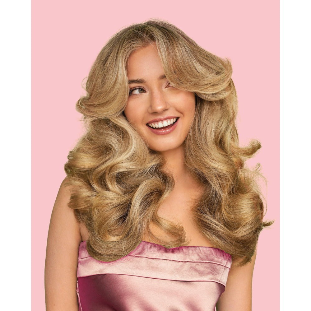 Model with volume and texture styled using Design Me Puff Me Dry Texture Spray