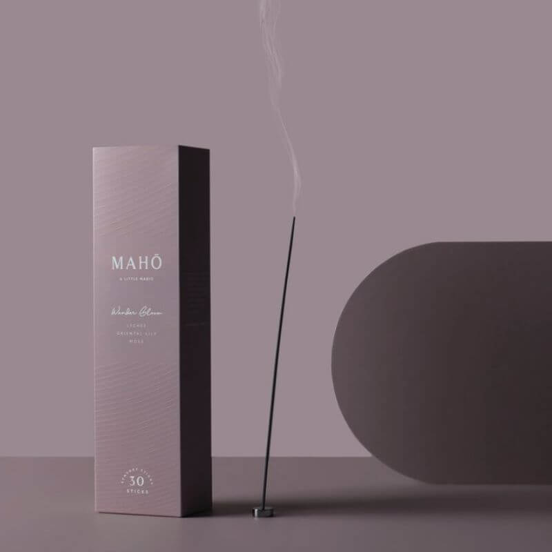MAHŌ Wander Boom incense is shown burning alongside the box